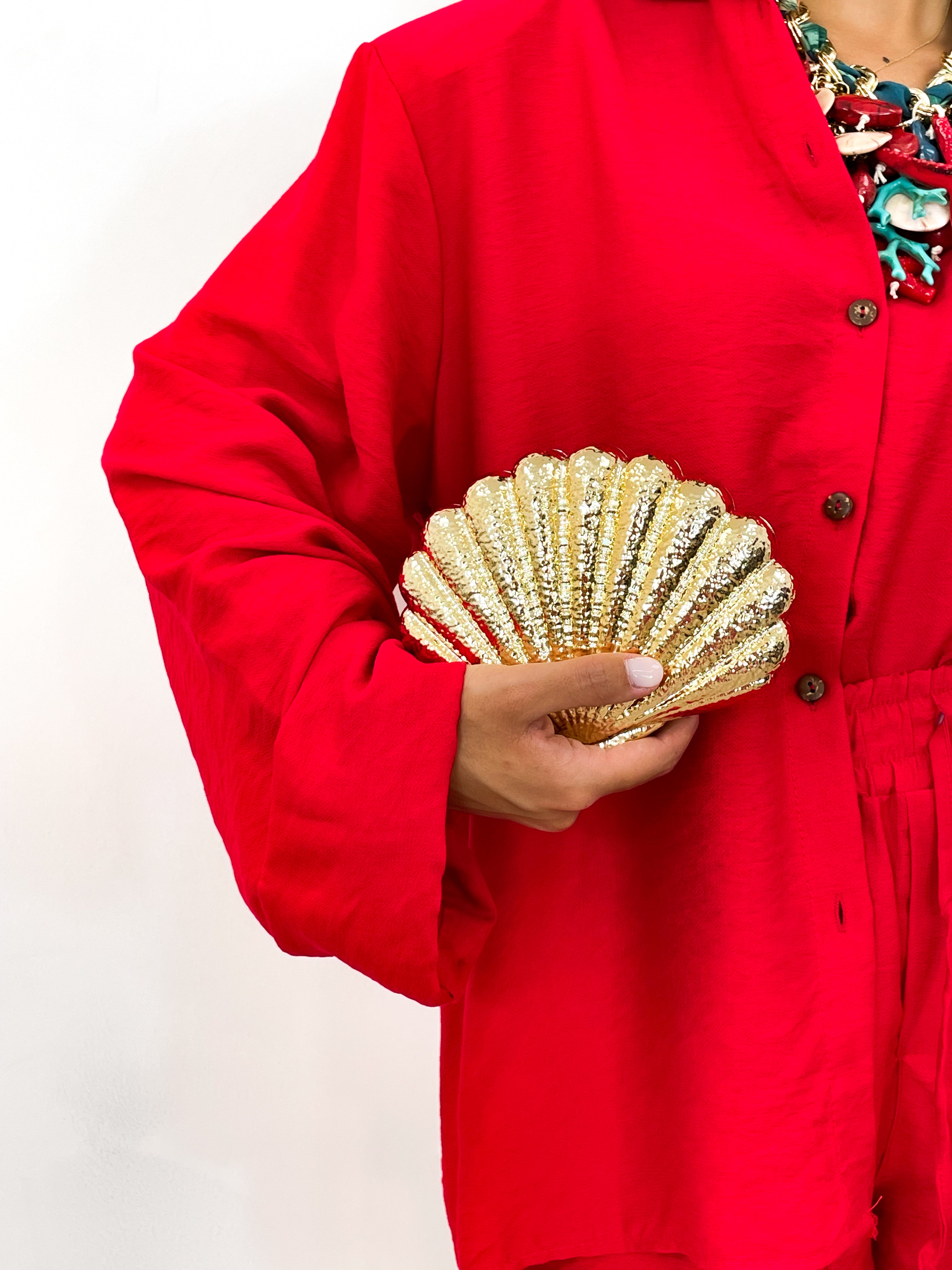 Clutch conchiglia oro